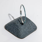 December blue zircon birthstone bangle in silver featuring stunning blue crystals on clasp-free memory wire