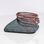 January garnet birthstone bangles in silver with red crystals stacked showing flexible memory wire design