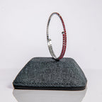 July ruby birthstone bangle in silver featuring passionate red crystals on clasp-free design