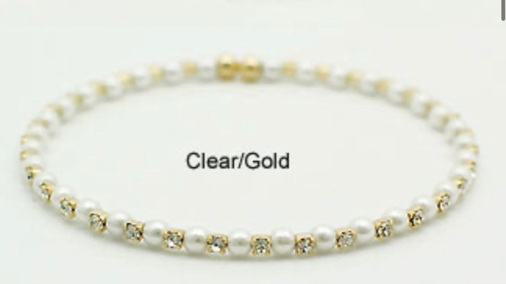 June pearl birthstone bangle in gold showing elegant pearl crystals and flexible memory wire detail