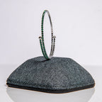 May emerald birthstone bangle in silver featuring vibrant green crystals on memory wire construction